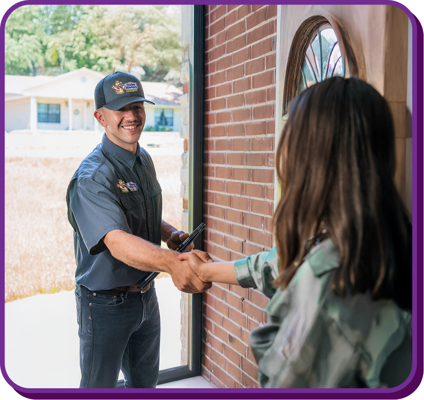 customer shaking a plumbers hand